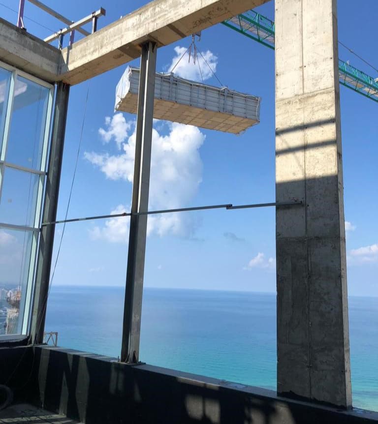 Seaside skyscraper swimming pool installation by IMAGINOX