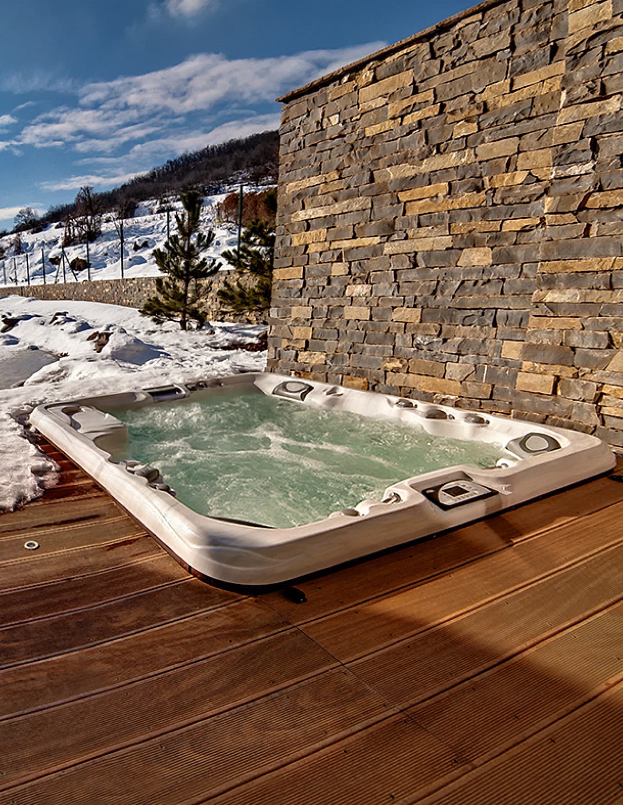 Fully recessed hot tub in the ground