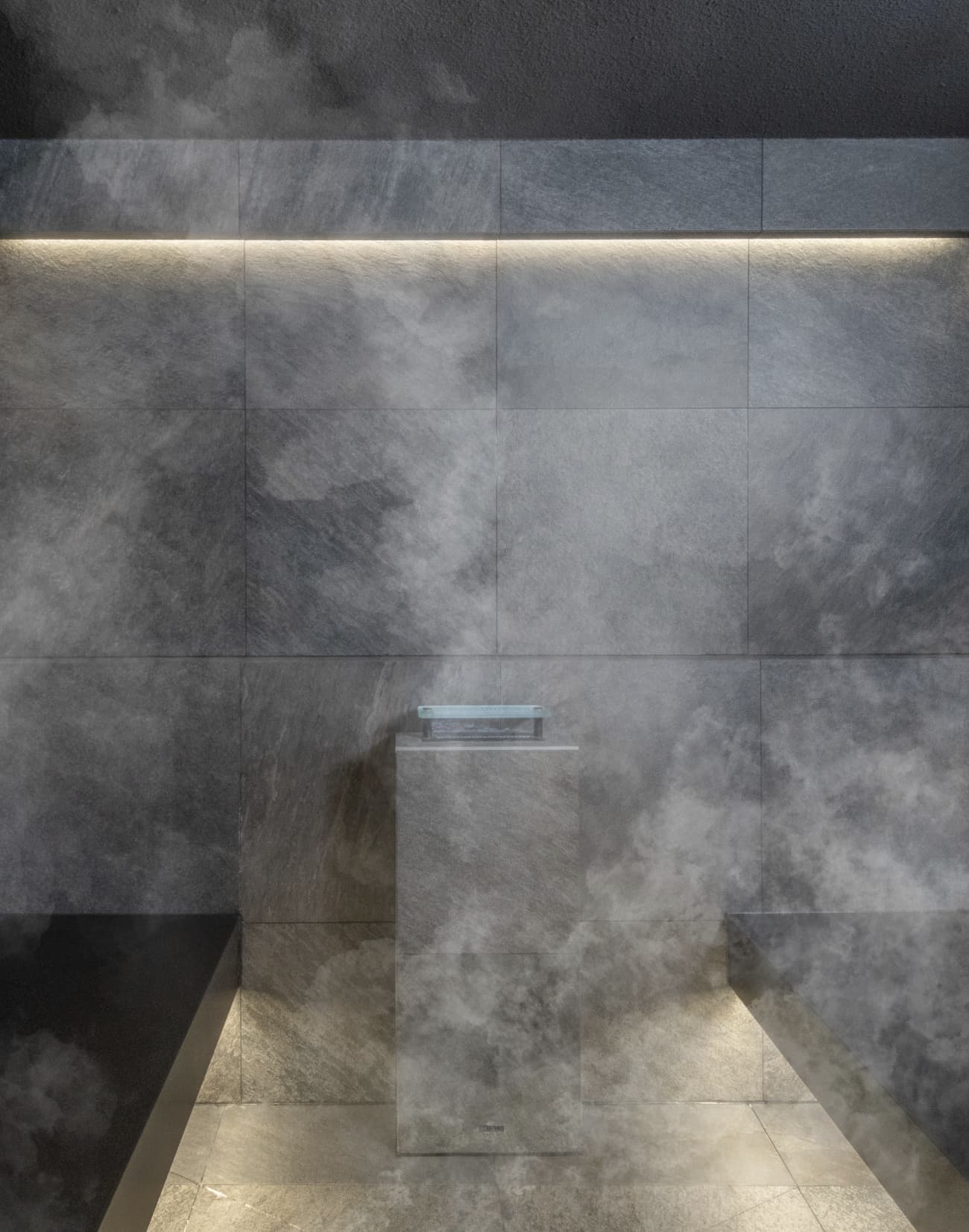 Luxury steam bath with a paneling of a natural stone
