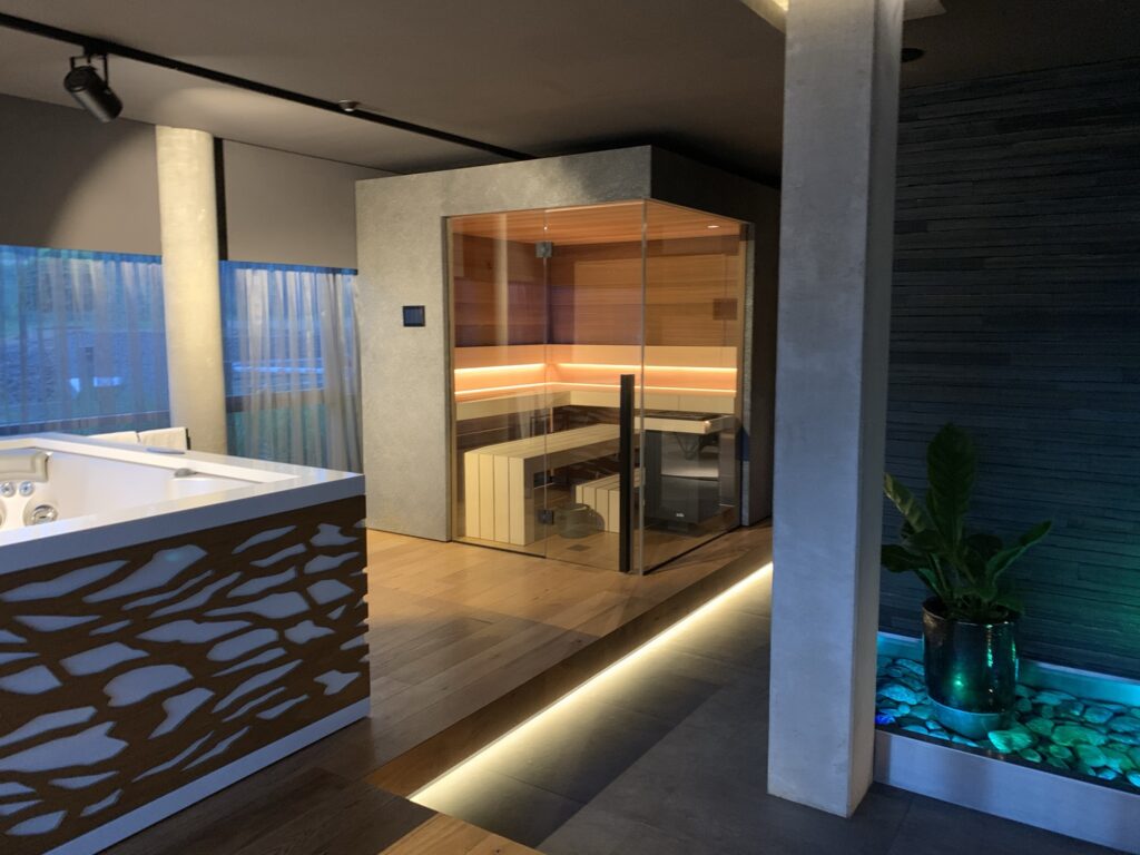 Luxury glass wall private sauna TAO by IMAGINOX GROUP