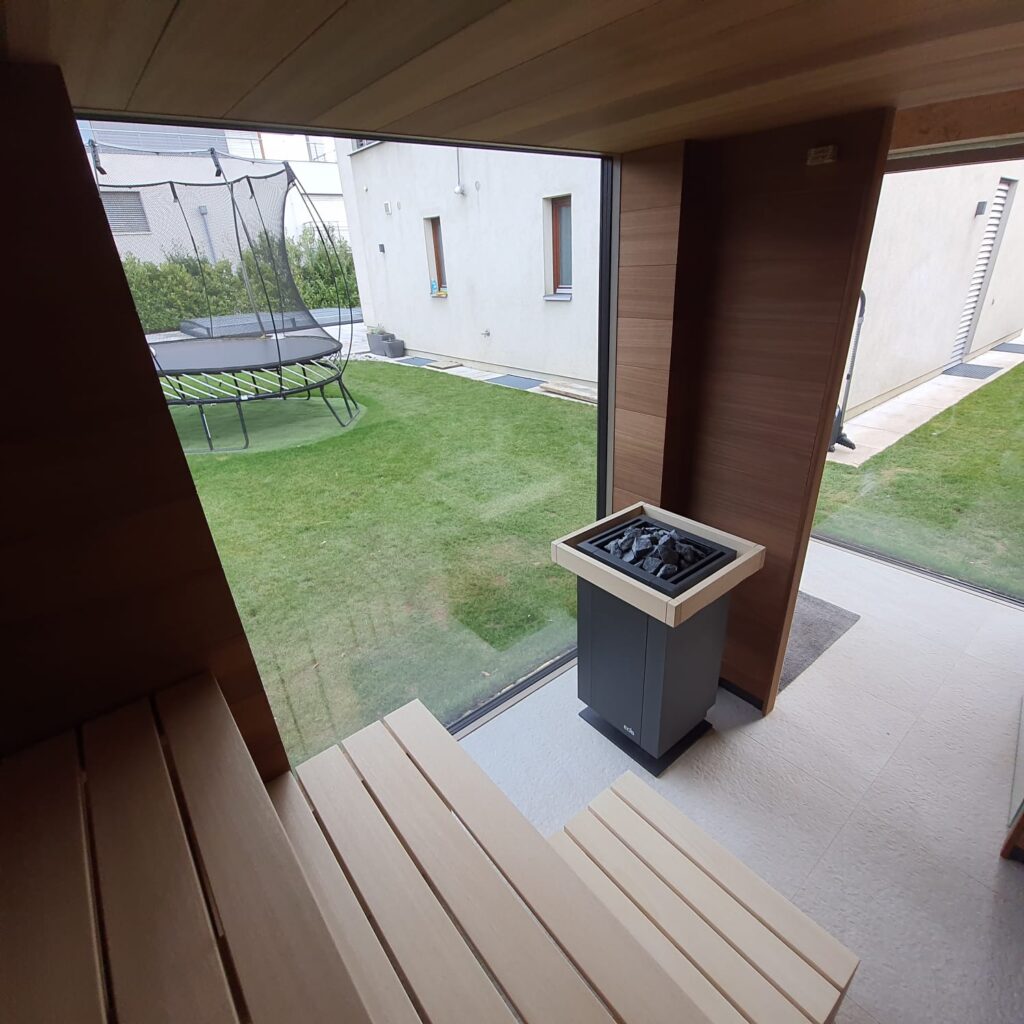 Sauna TAO with glass wall and garden view