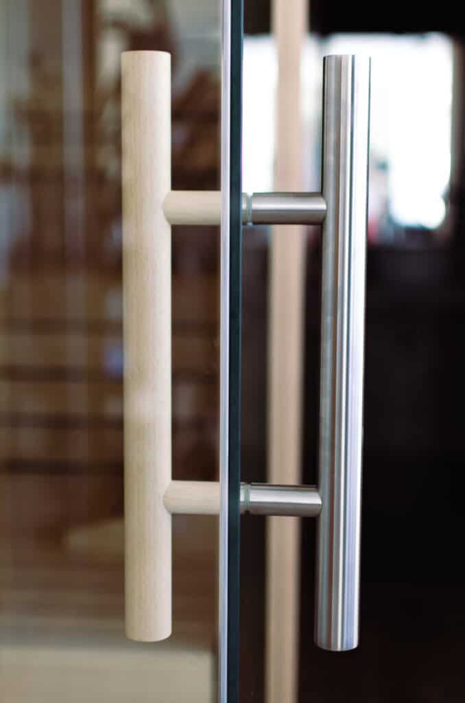 Detail of a stainless-steel and wooden grip