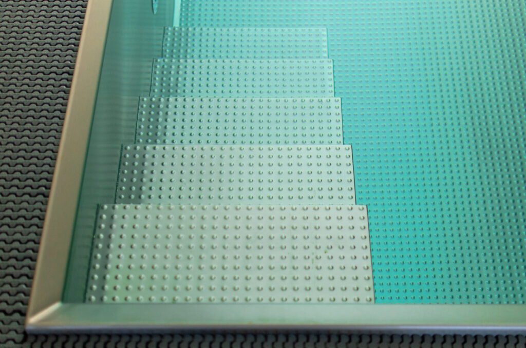 Detail of stainless steel staircase in the IMAGINOX pool