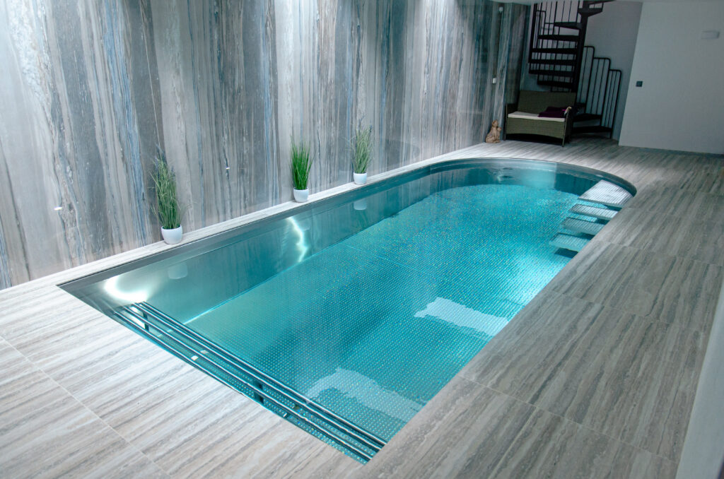 Original stainless steel pool in the relaxation zone of the family house
