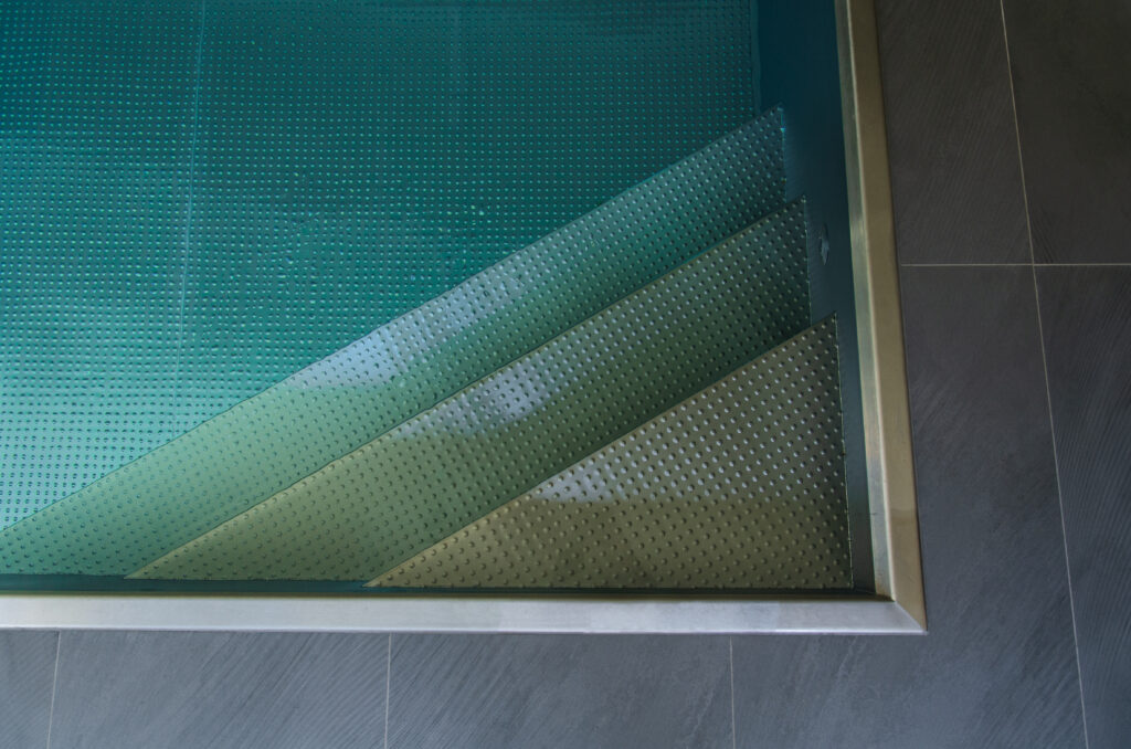 Round dimples at stainless steel staircase IMAGINOX