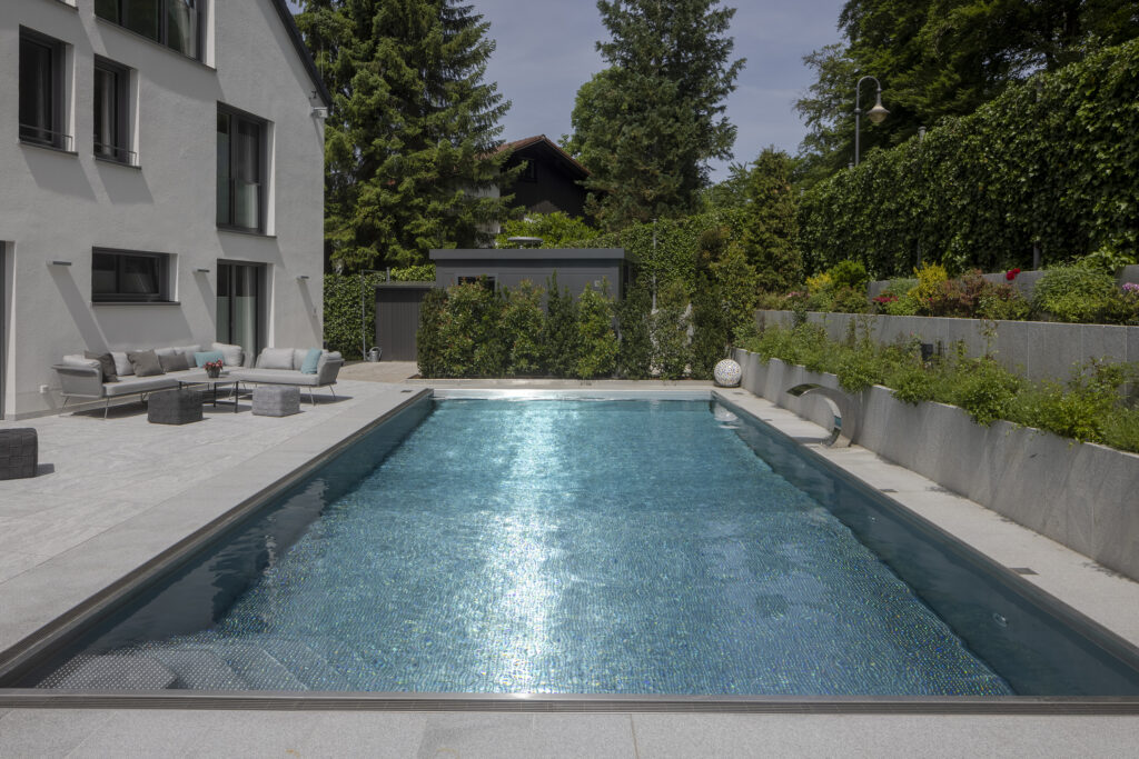 Individual stainless steel skimmer pool in family garden