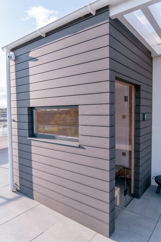 Outdoor sauna with a window