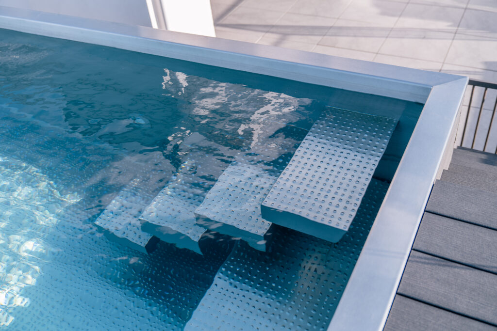 Detail of bracketed staircase with round dimples